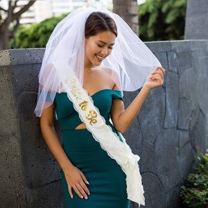 "Bride to Be"  Veil & White lace sash. Used once.